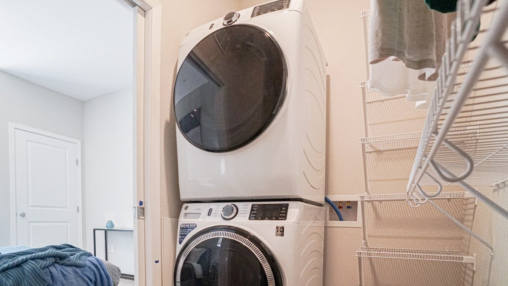a washer and dryer in a laundry room at The Yards and Backyards, Saint Paul