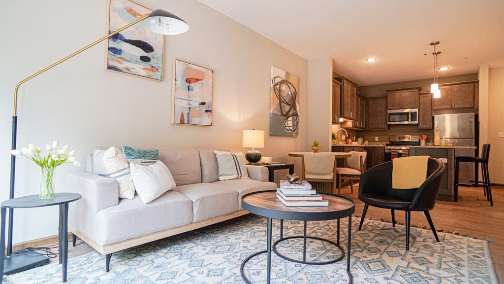 a living room with a couch and a table