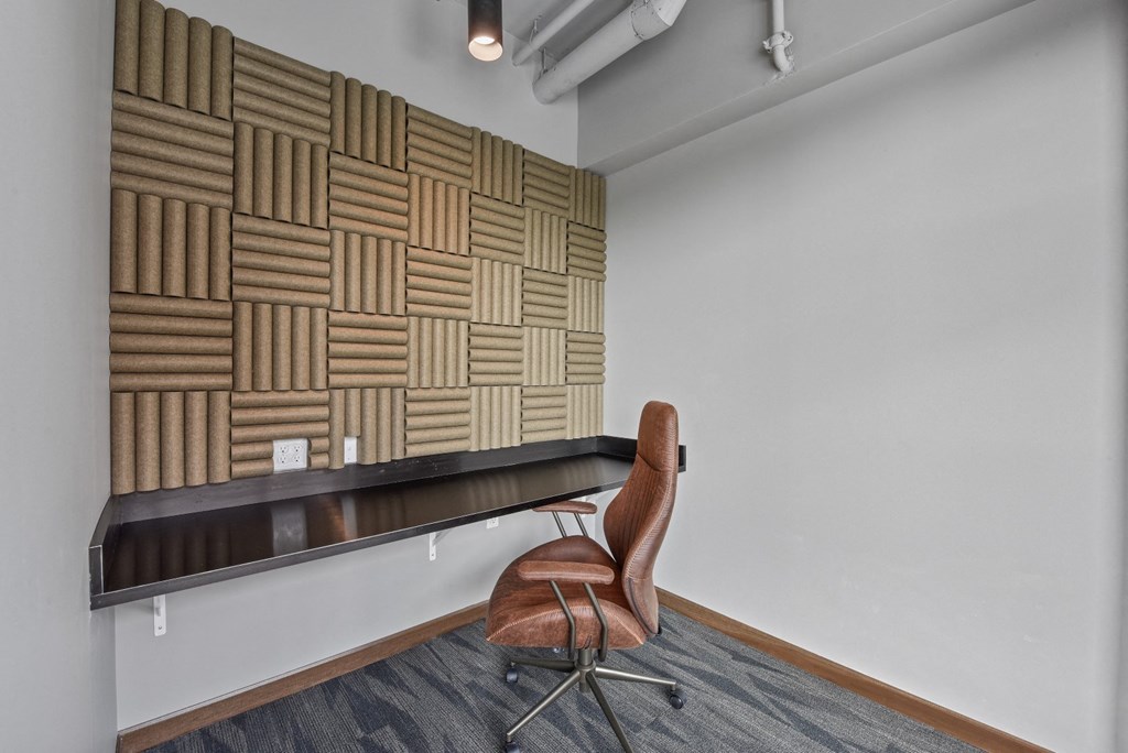 a chair and a desk in a room