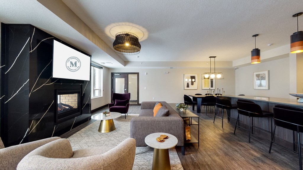 a living room filled with furniture and a fire place at The Morrison, Minnesota, 55068