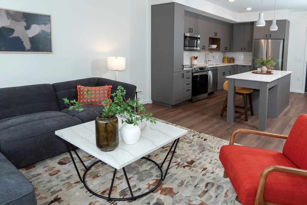 a living room with a couch and a table