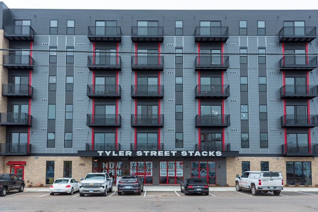 a screenshot of a building with cars parked in it