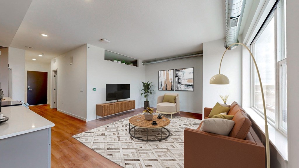 a living room with a couch and a table