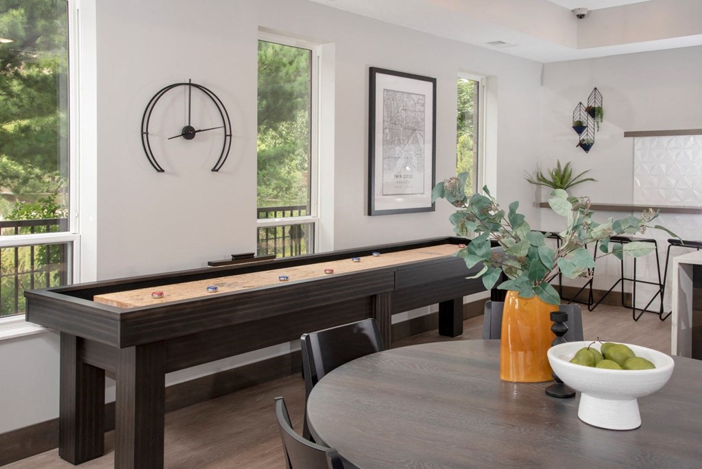 Shuffleboard table in community room at UPII at Urban Park I and II Apartments, St Louis Park, Minnesota