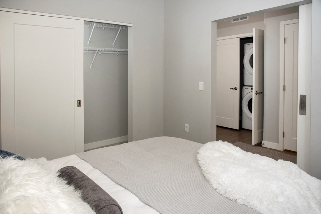 UPII foley alcove floor plan - bedroom with spacious closet, in-home washer and dryer at Urban Park I and II Apartments, St Louis Park, 55426