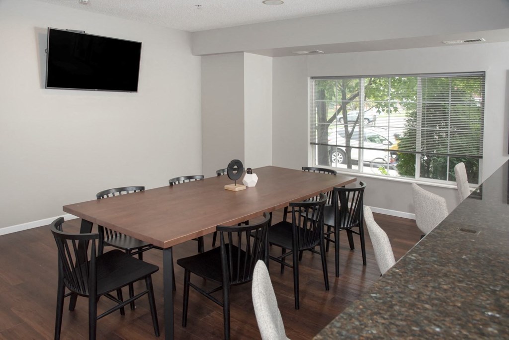 UPI community room with tv at Urban Park I and II Apartments, St Louis Park, MN, 55426