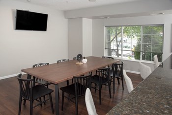 Community room with tv Community room with tv at Urban Park Apartments, St Louis Park, 55426 - Photo Gallery 5