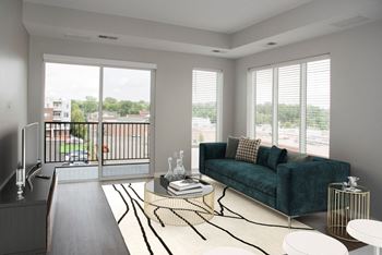 living room with floor to ceiling windows and balcony at Urban Park I and II Apartments, St Louis Park, 55426