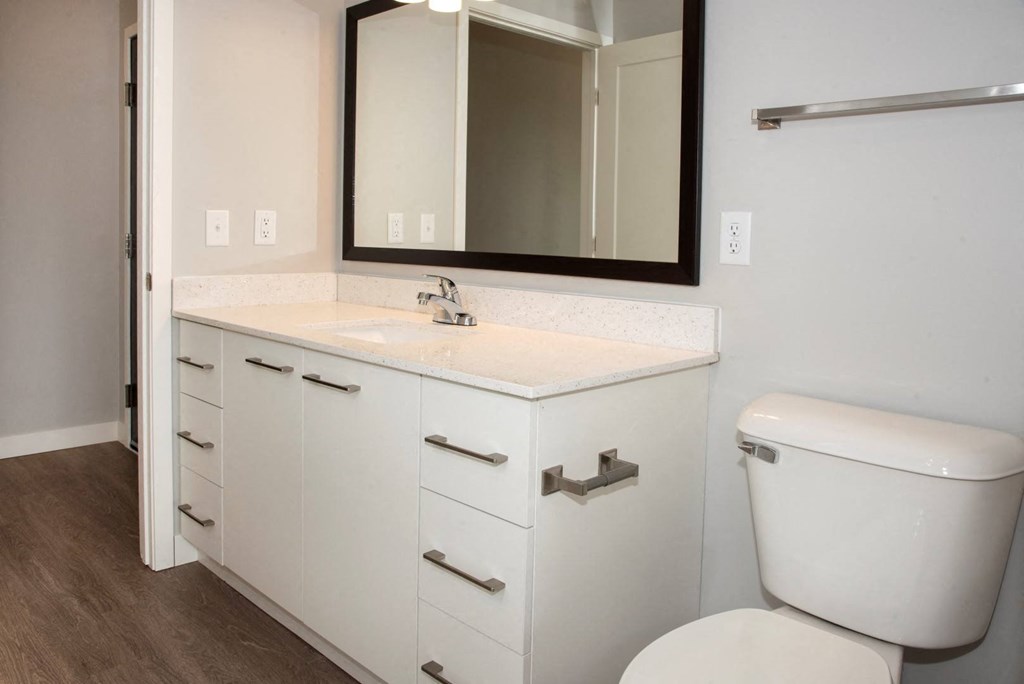 Large bathroom with quartz top at Urban Park I and II Apartments, St Louis Park