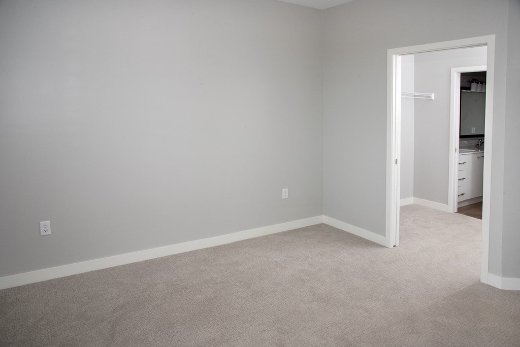 Marc 2 br master bedroom with walk-in closet and bath at Urban Park I and II Apartments, St Louis Park