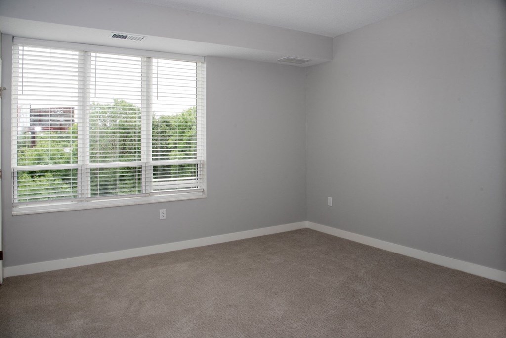 Marc floor plan bedroom with large windows at Urban Park I and II Apartments, Minnesota, 55426