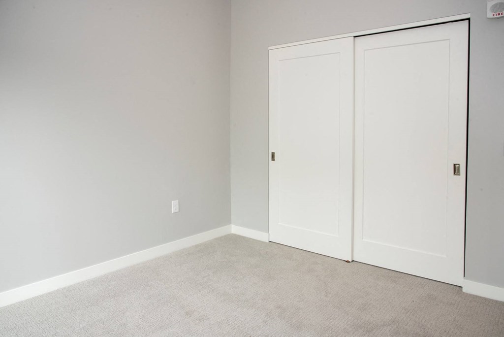 Nordic bedroom with spacious closet at Urban Park I and II Apartments, Minnesota, 55426