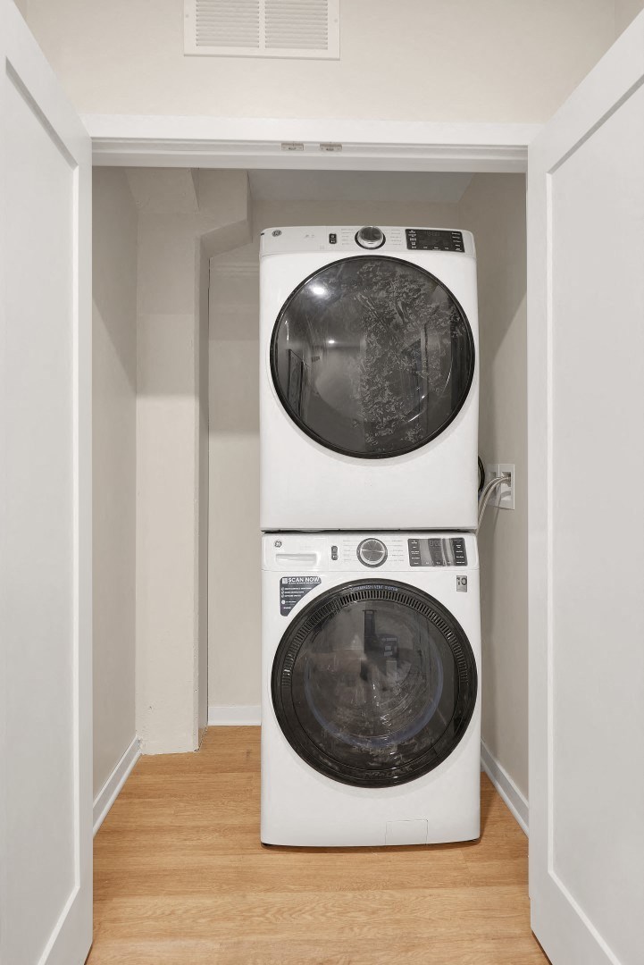 a washer and dryer in a small laundry room