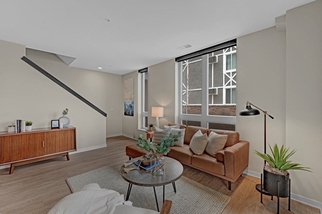 a living room with a couch and a table