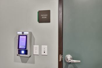 A door with a handle and a sign that says package room.