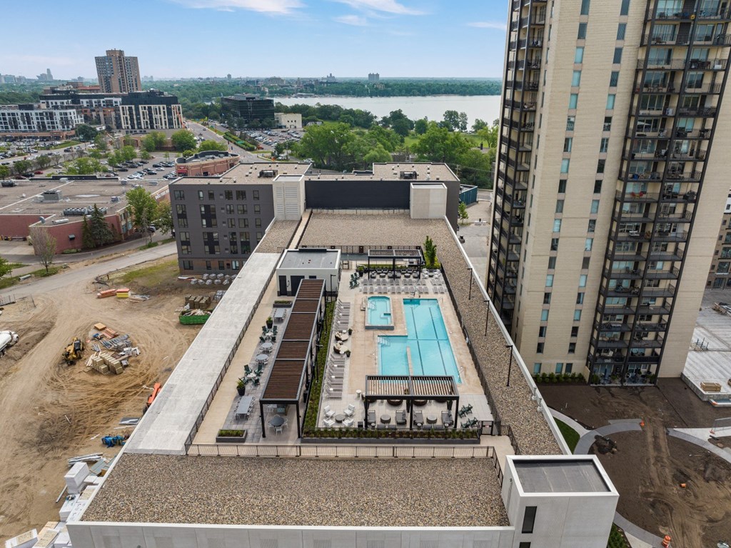 a view of the pool from the top of the building