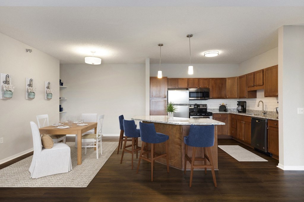 Dining Area with Kitchen View at Waterstone Place in Minnetonka