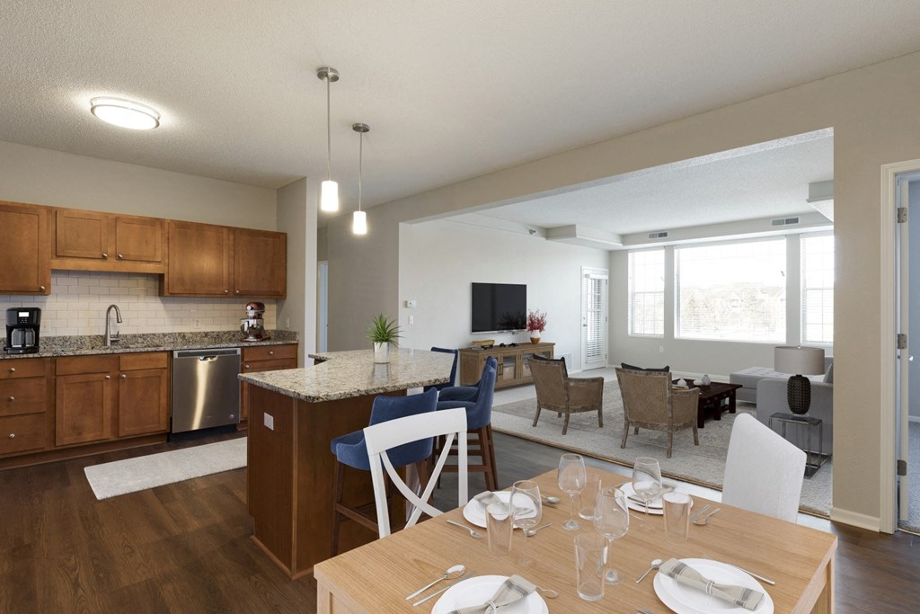 Open Living Room , Kitchen and Dining Area at Waterstone Place in Minnetonka, MN 55305