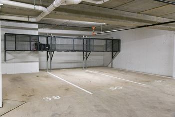 underground parking with storage above parking stall