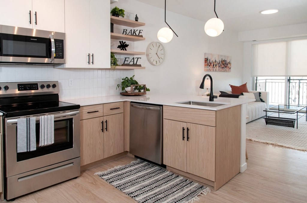 Fully Equipped Kitchen Includes Frost-Free Refrigerator, Electric Range, & Dishwasher at CityLine Apartments, Minnesota, 55406