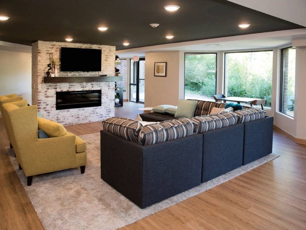 Community room with fireplace and tv at Aspenwood Apartments, Eagan, 55123