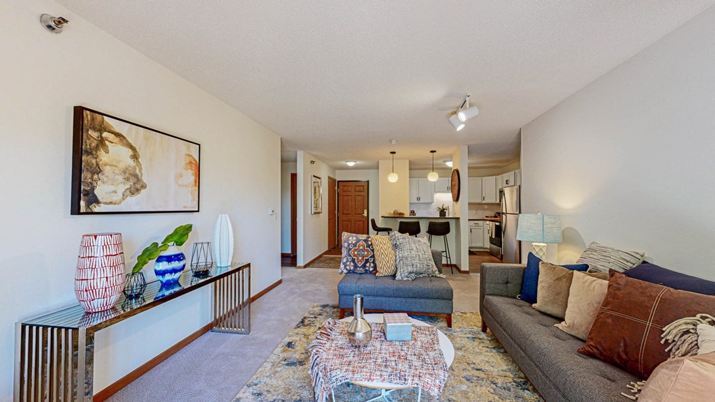 a living room with a couch and a table