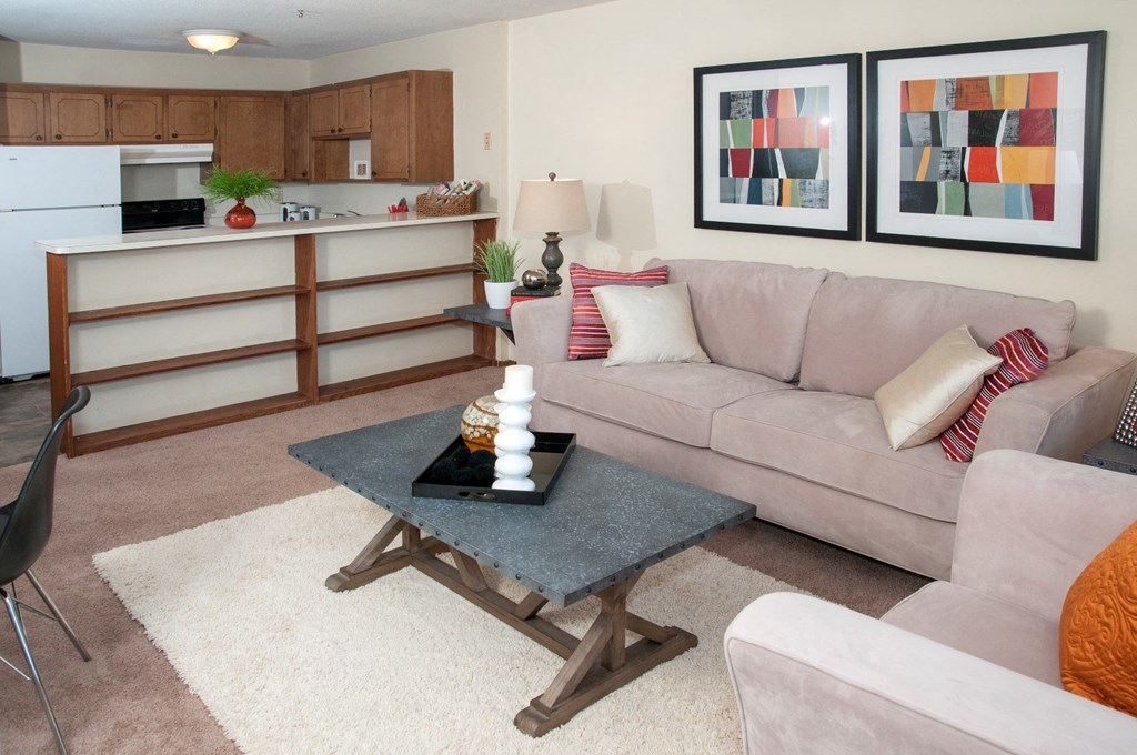 a living room with a couch and a table