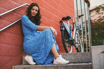 Woman Posing With Her Bicycle Property Image