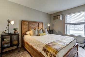 Comfortable Bedroom at Audenn Apartments, Minnesota, 55438 - Photo Gallery 15