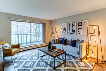 Spacious Living Room at Audenn Apartments, Minnesota - Photo Gallery 13
