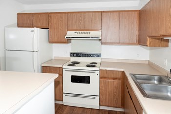 Efficient Appliances In Kitchen at Audenn Apartments, Bloomington, Minnesota - Photo Gallery 22