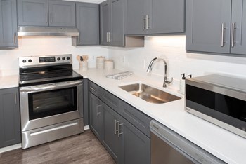 Kitchen Appliances Kitchen Appliances at Audenn Apartments, Minnesota - Photo Gallery 4