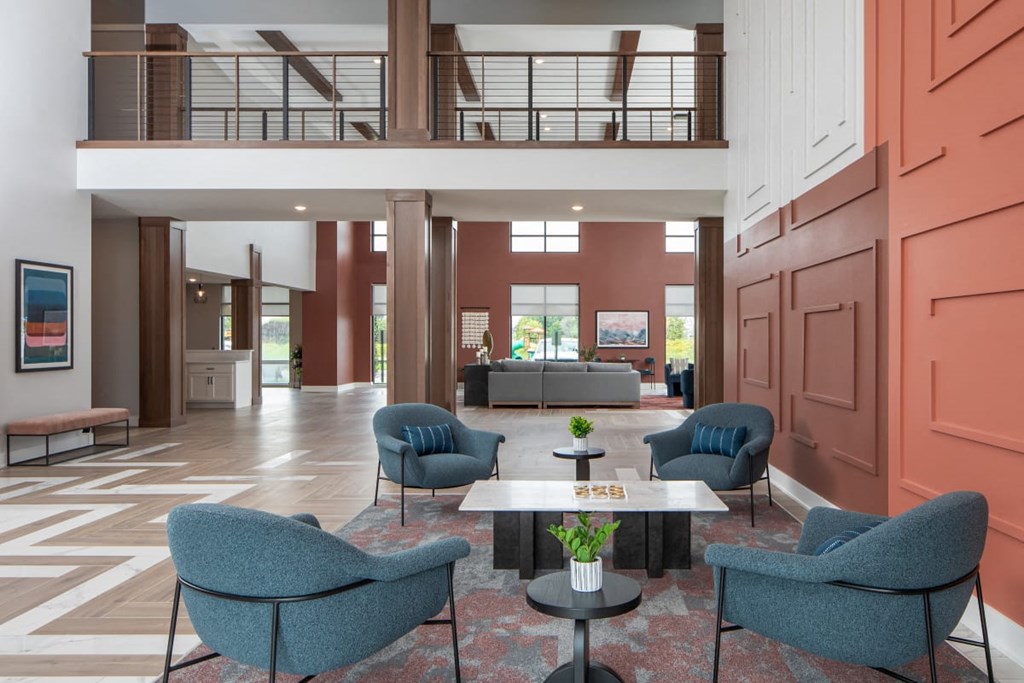 A living room with a couch, chairs, and a coffee table.at The Edison at Maple Grove, Maple Grove