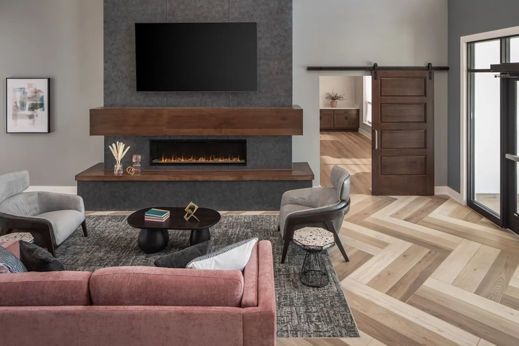 Clubroom With Fireplace And TV at The Edison at Maple Grove, Maple Grove, 55311