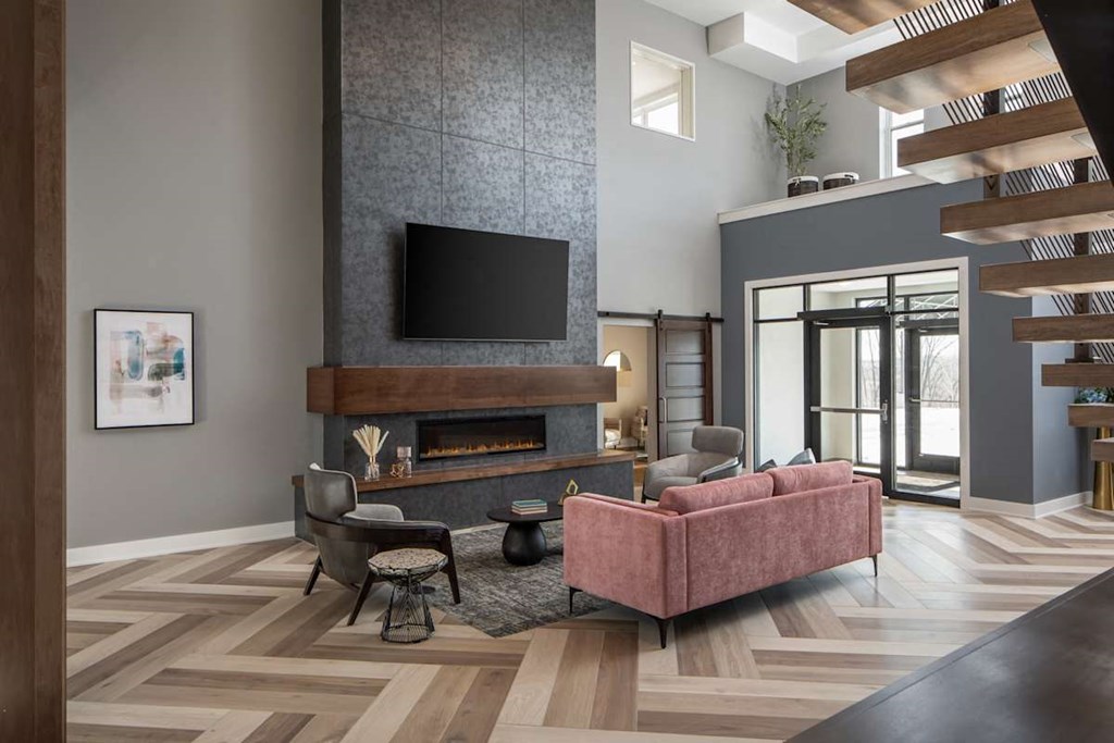 Clubroom With TV And Fireplace at The Edison at Maple Grove, Minnesota