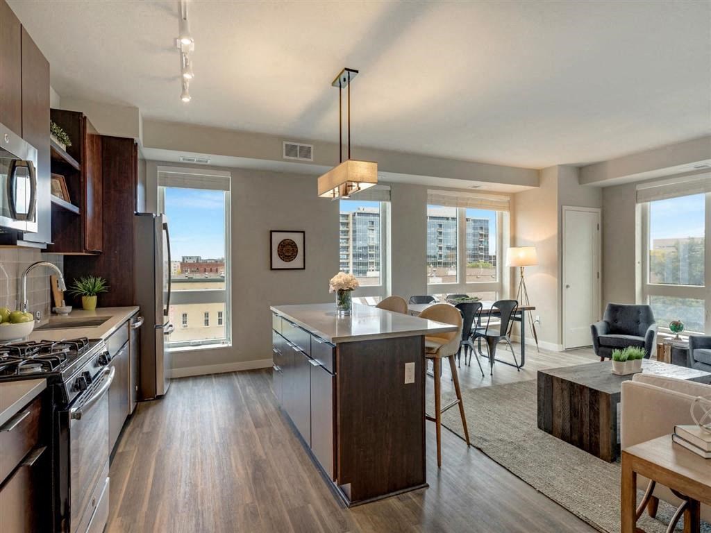 Kitchen along with living room at The M on Hennepin, Minnesota, 55414