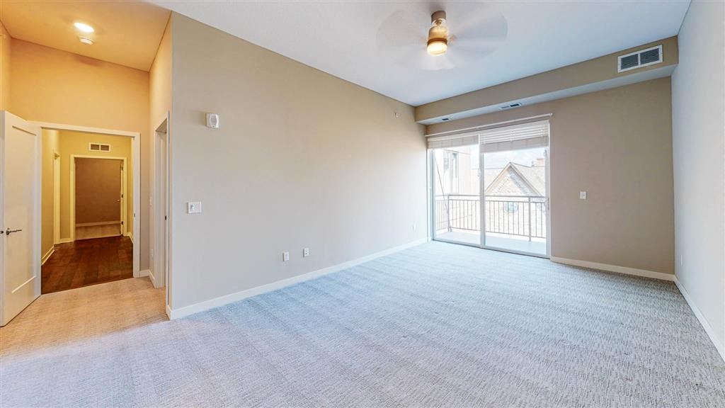 Carpeted Living Area at The M on Hennepin, Minneapolis