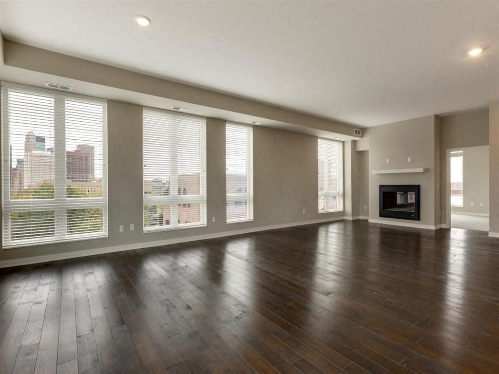 Specious bedroom with fireplace at The M on Hennepin, Minneapolis, Minnesota