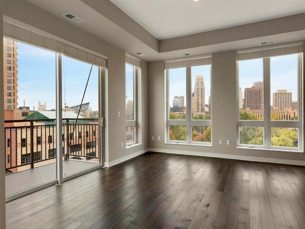 specious room along with large windows at The M on Hennepin, Minnesota, 55414