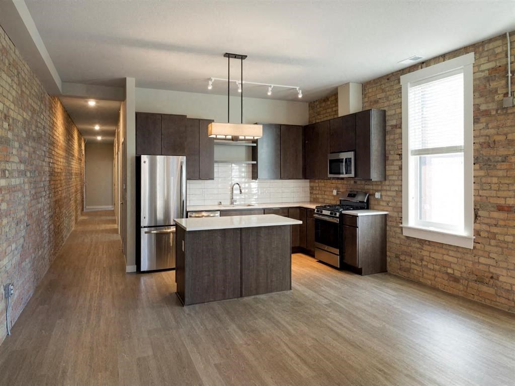 Kitchen with large windows at The M on Hennepin, Minneapolis, MN, 55414