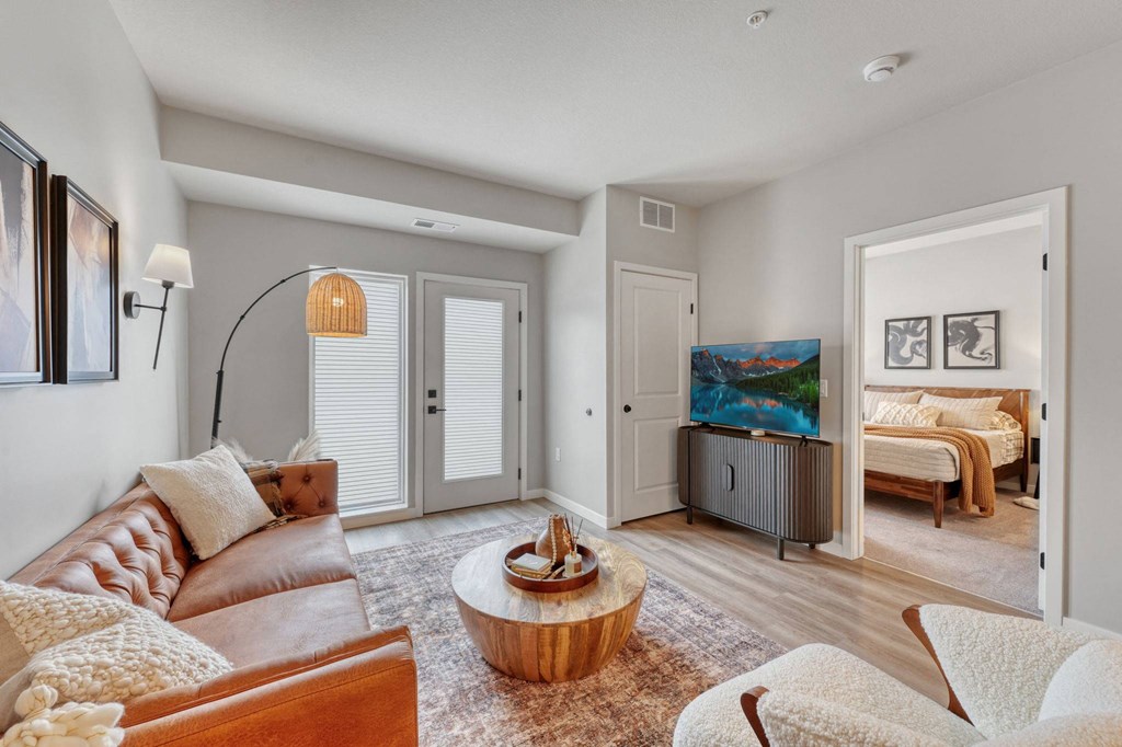 living area along with bedroom at Lochner Apartments, White Bear Lake, Minnesota