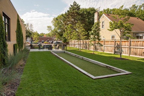 outdoor patio with bocce ball court