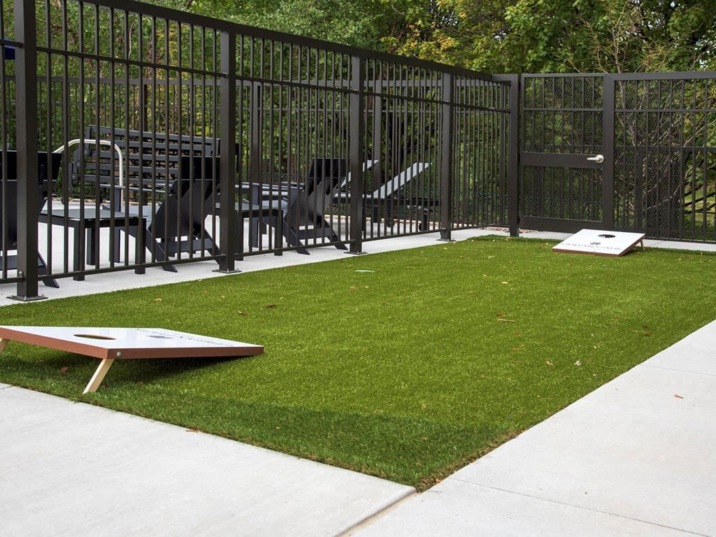 UPII corn hole games on patio at Urban Park I and II Apartments, St Louis Park, 55426