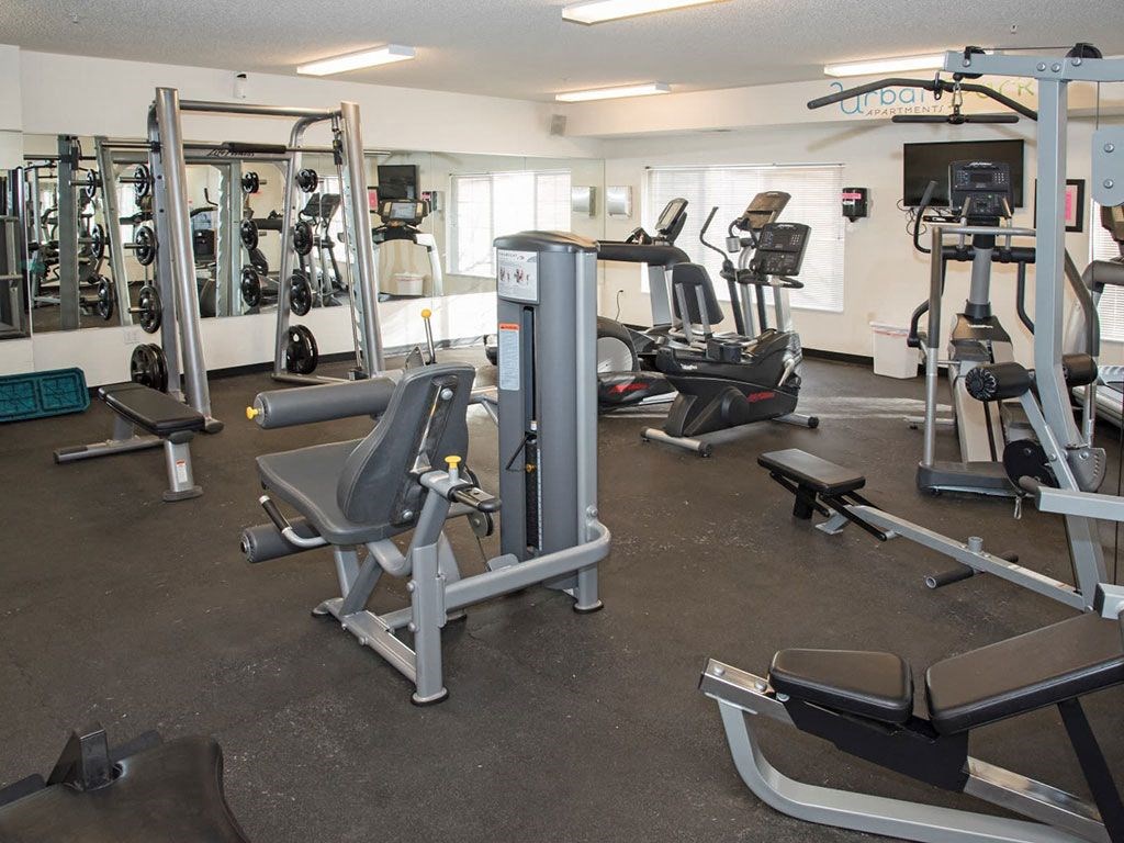 fitness room with weights at Urban Park I and II Apartments, St Louis Park, MN, 55426
