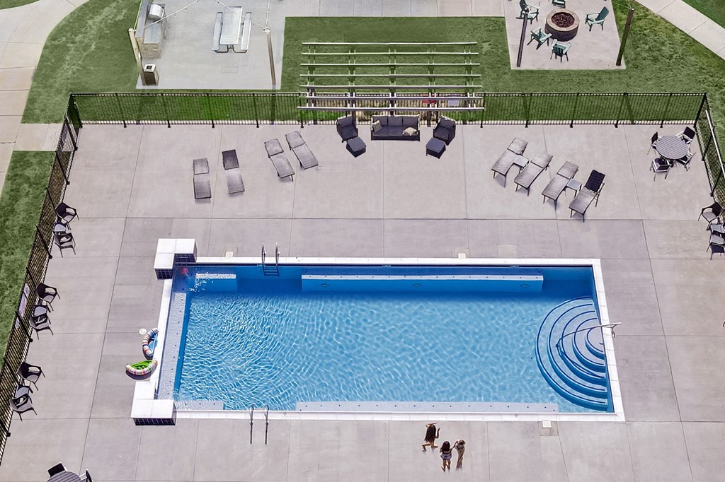an overhead view of a swimming pool at a resort