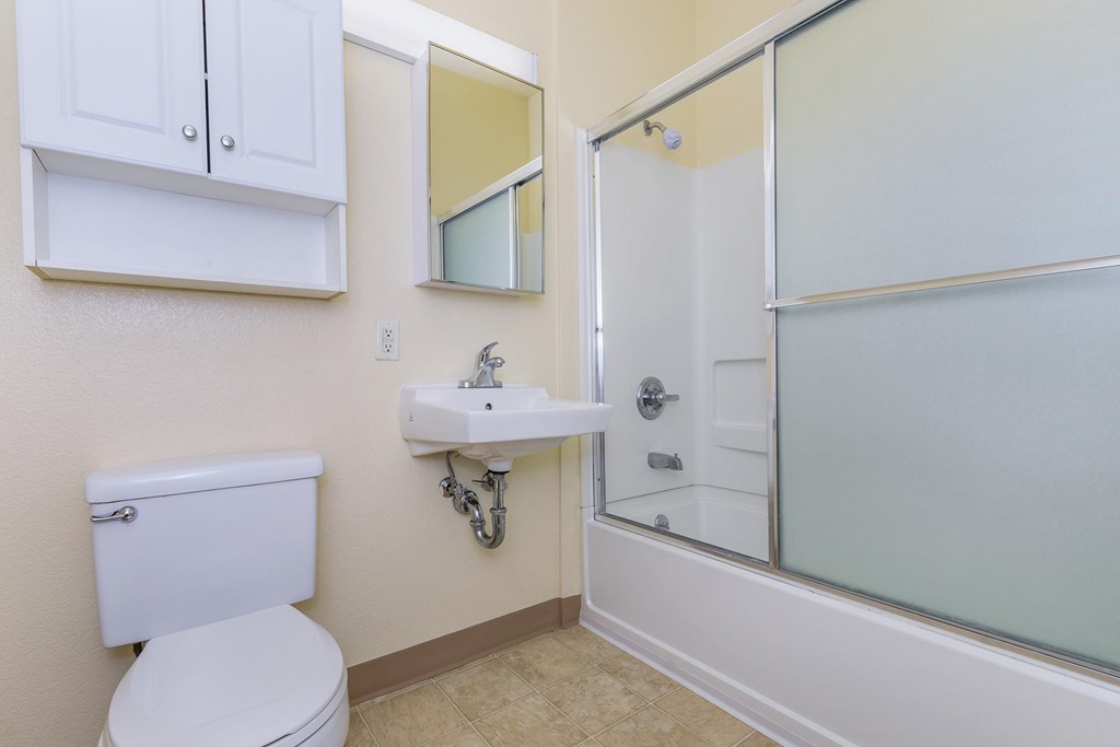 A White Toilet Sit at Atrium Garden Apartment Homes, LLC, San Jose, CA