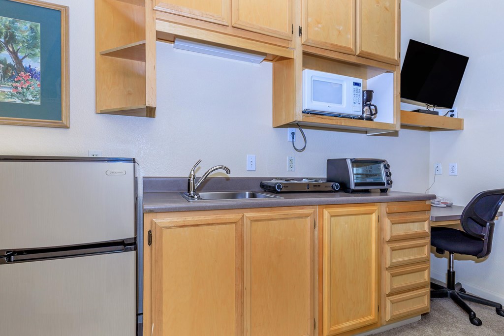 A Kitchen With a Fridge at Atrium Garden Apartment Homes, LLC, California, 95112