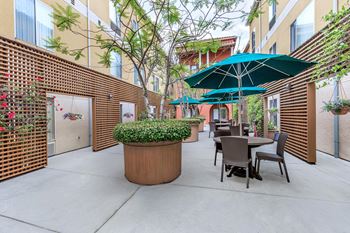 A Patio With a Chairs at Atrium Garden Apartment Homes, LLC, San Jose
