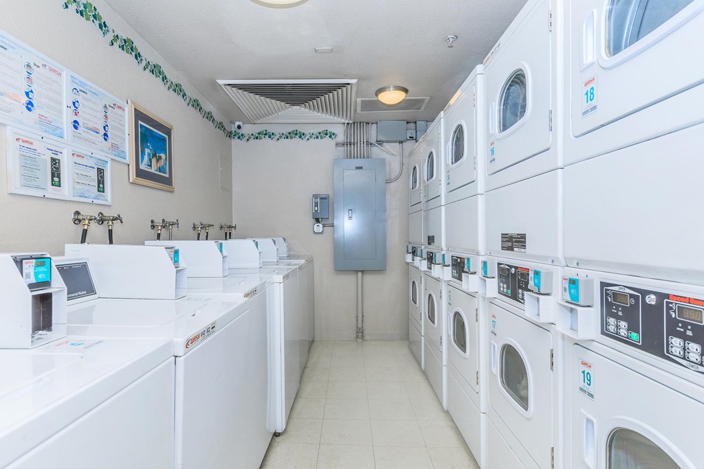 A Row Of Washing Machines at Atrium Garden Apartment Homes, LLC, California