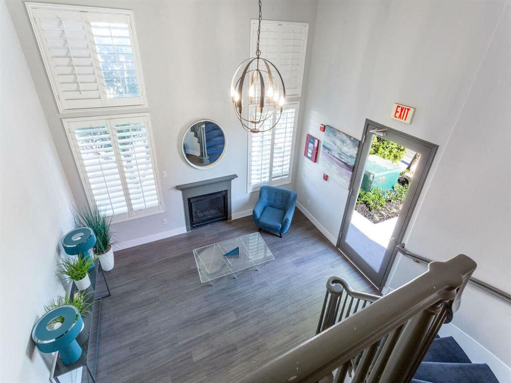 a view of a living room from the top of a staircase at Warner Center Townhomes, California, 91303